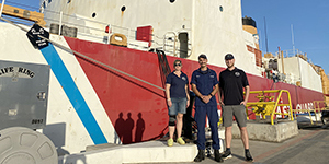 Image showing team members standing in front of the U.S. Coast Guard Cutter Polar Star