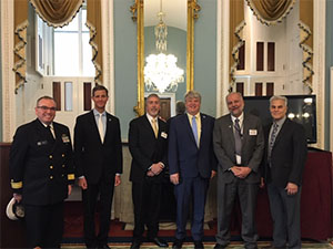 Rear Adm. Shep Smith, Rear Adm. Timothy Gallaudet, Capt. Andrew McGovern, Sean Duffy, Rich Edwing, and Jeff Payne.