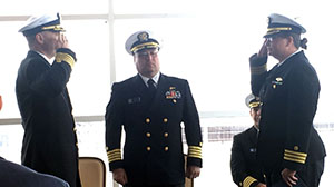 Cmdr. Briana Welton Hillstrom accepts command of NOAA Ship Thomas Jefferson, replacing Capt. Chris van Westendorp as Capt. David Zezula facilitates the exchange.