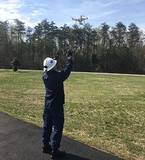 Lt. j.g. Matthew Sharr with an unmanned aircraft system in Woodford, VA