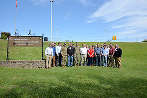 An image showing a group photo of the USACE Inland Waterways Board Members, federal observers and USACE Staff at the New Orleans Inner Harbor Navigation Canal Lock.
