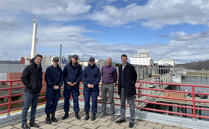 Coast Survey personnel tour the Port of Alaska during their stop in Anchorage, Alaska. Shown from left to right: Andy Kampia, LT Caroline Wilkinson, RDML Ben Evans, LTJG Gabriella McGann, Jim Jager (Director of Business Continuity and External Affairs), and Nathan Wardwell (HSRP Member).