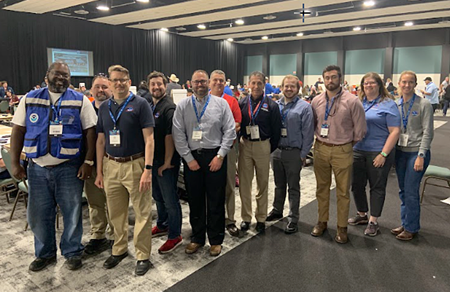 A group image showing Western Gulf Navigation Manager Quentin Stubbs (far left)  along with several conference attendees at the 11th Annual Coast Bend Hurricane Conference.