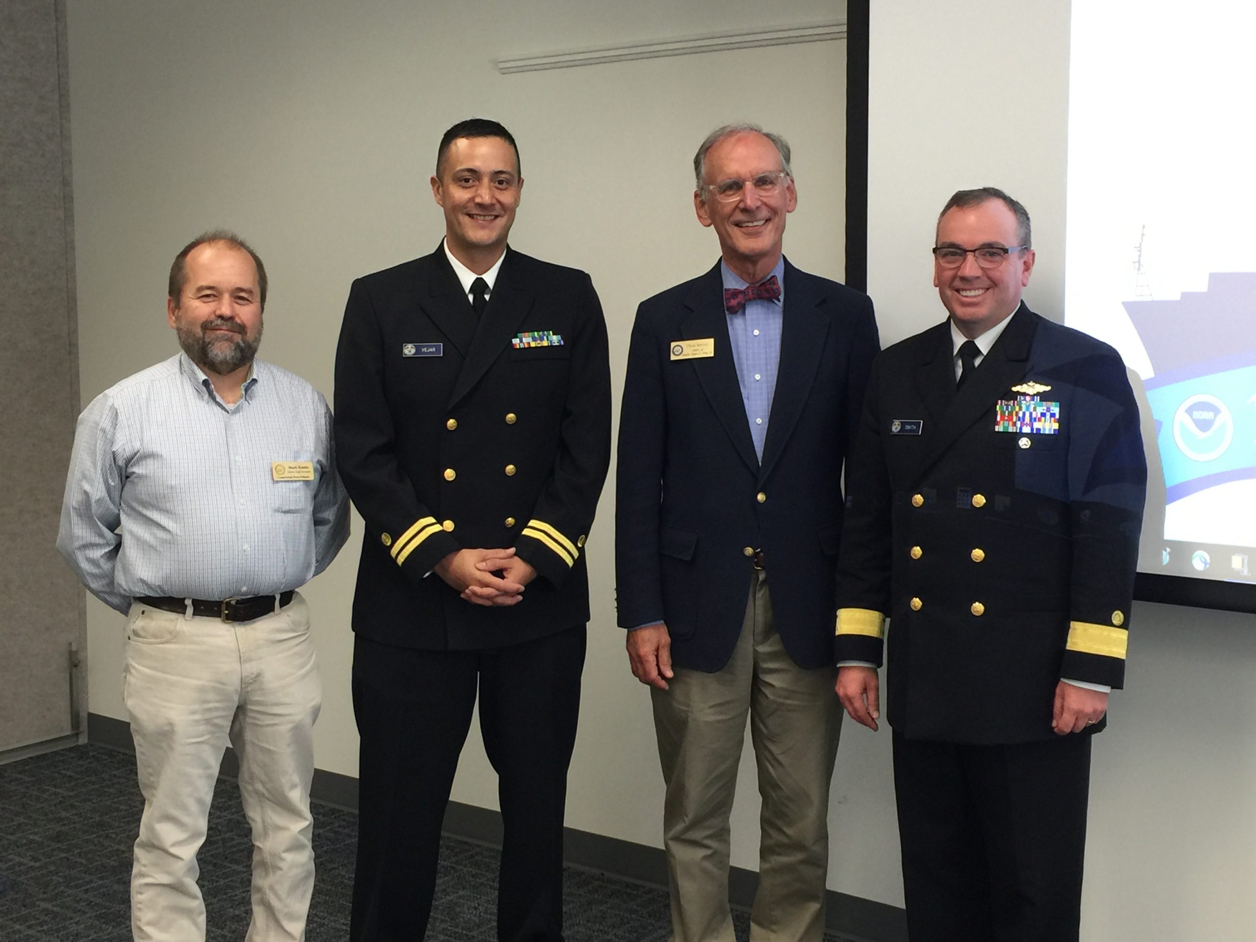Mark Kontio, Maine staff assistant for Congressman Bruce Poliquin, Lt. David Vejar, northeast navigation manager, Chris Rector, regional representative for Senator Angus King, Rear Adm. Shep Smith, director of Office of Coast Survey, at the stakeholder meeting in Maine.