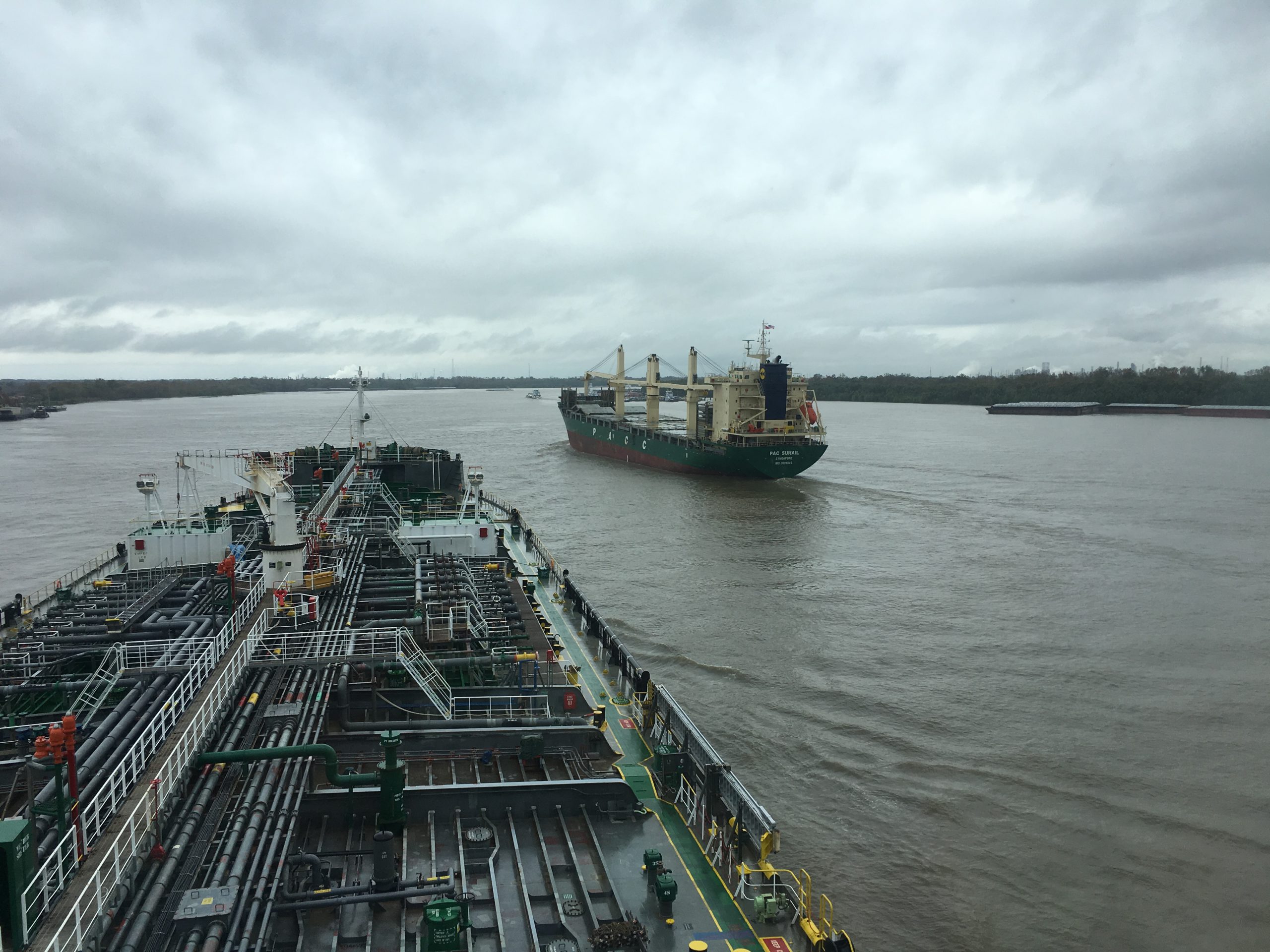 Ships passing on the lower Mississippi River.