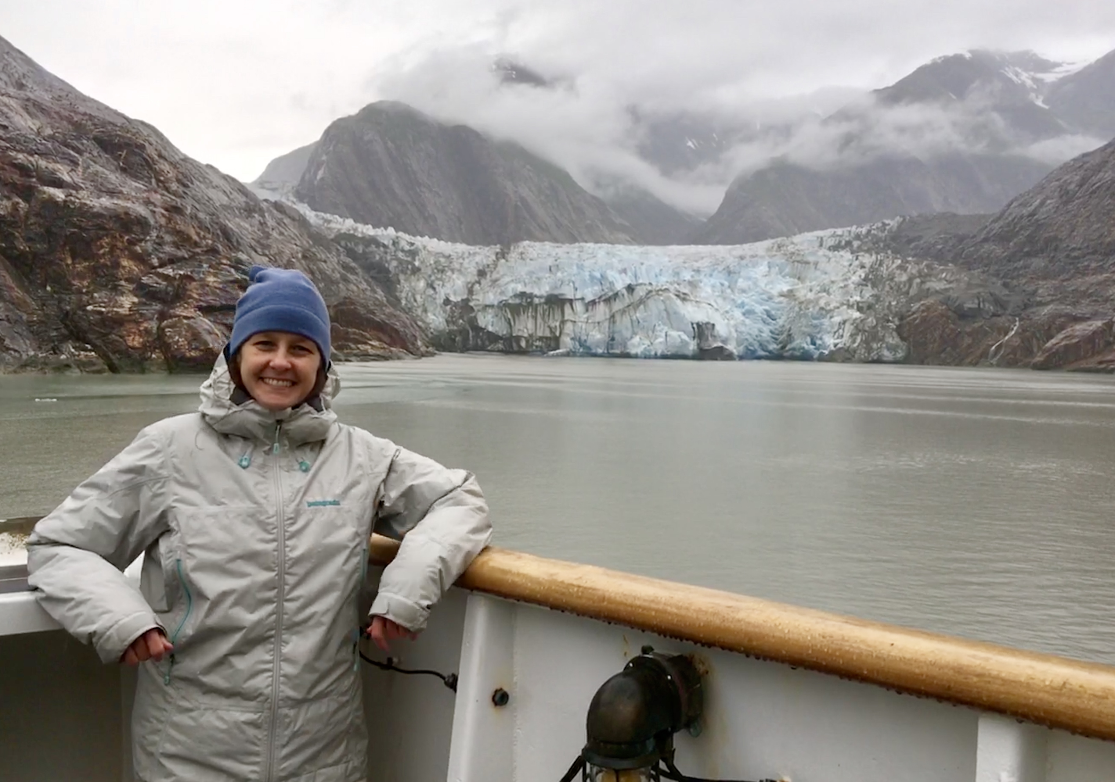 Martha Herzog enjoying the view of Sawyer Glacier in Tracy Arm, Alaska while aboard the "NOAA Ship Rainier."