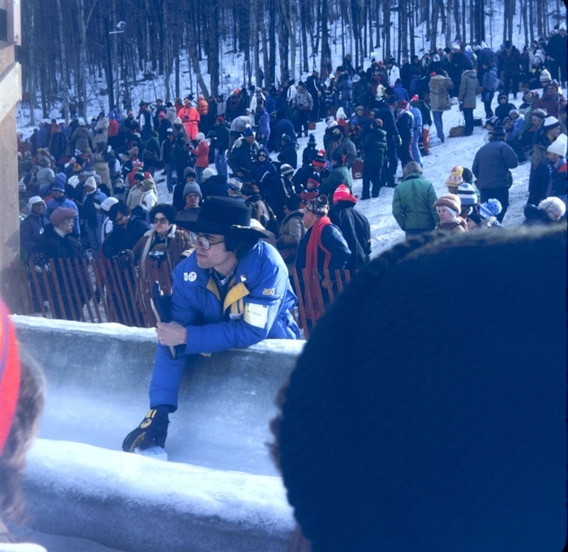 Meteorologist Jack May taking the ice temperature of the bobsled/luge track prior to the start of competition.