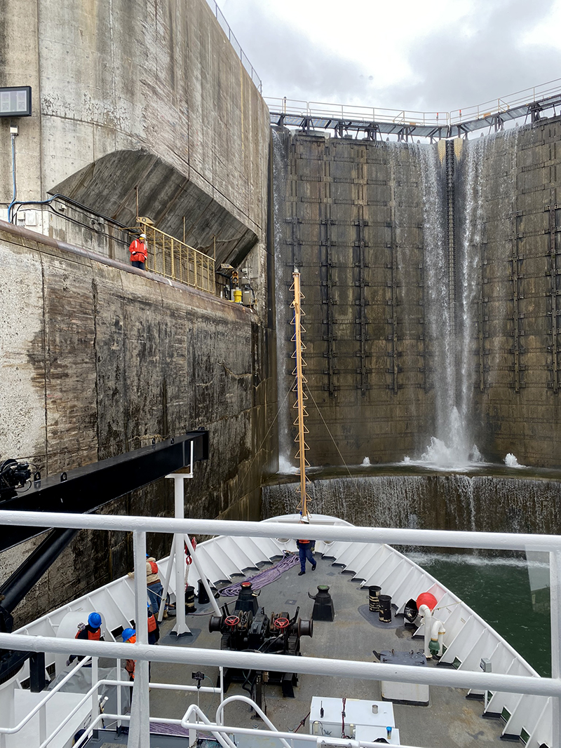 An image showing the bow of NOAA Ship Thomas Jefferson inside locks 4, 5, and 6 in the Welland Canal, Ontario, Canada.