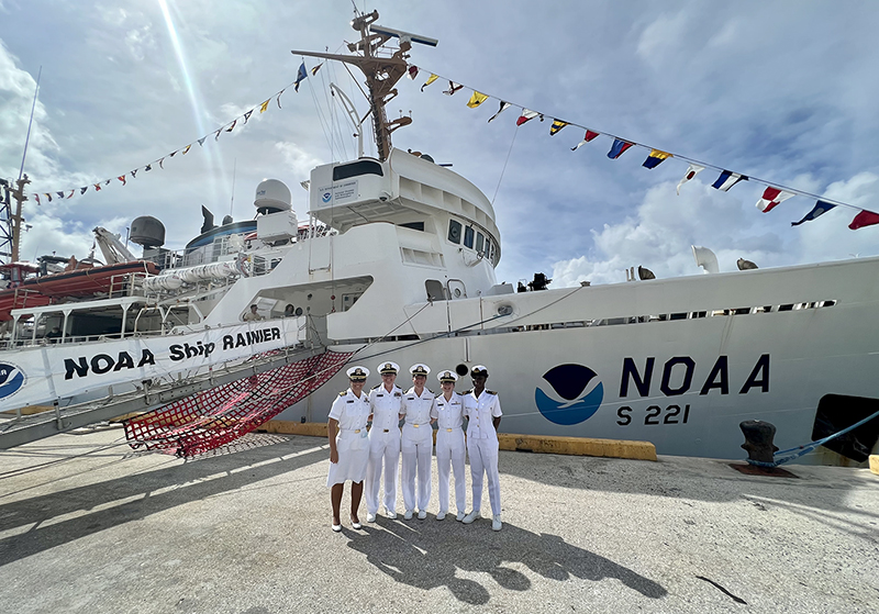 An image showing all woman officer hydrographers standing in front of NOAA Ship Rainier. 