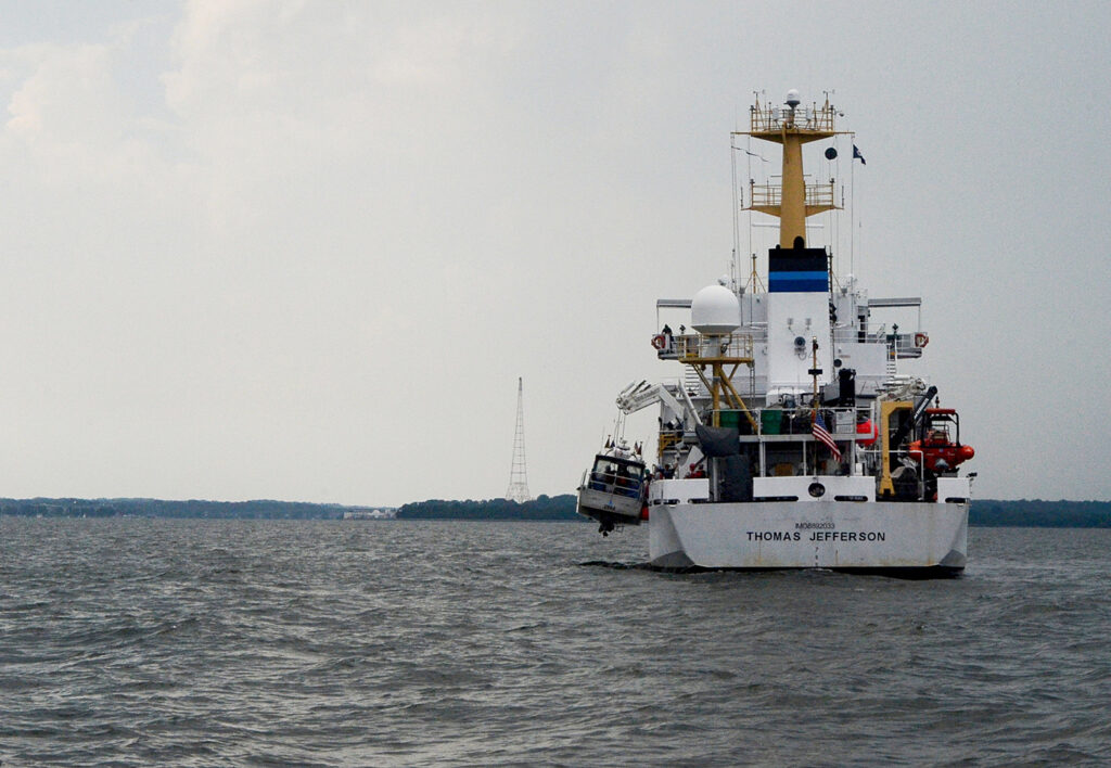 An image showing launch 2904 being lifted onto NOAA Ship Thomas Jefferson after survey operations.