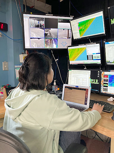 Chiaki Okada in charge of survey operations on NOAA Ship Thomas Jefferson near the entrance to Cleveland, Ohio.