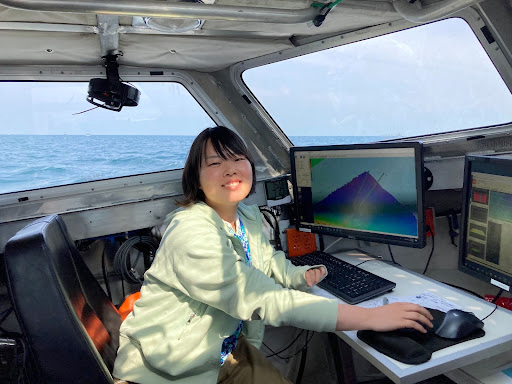 Chiaki Okada during survey operation and monitoring of the multibeam echo sounder data on survey launch 2904.