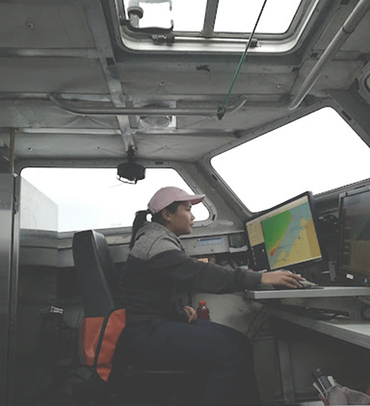 Firosa Tomohamat monitoring survey collection aboard the survey launch.