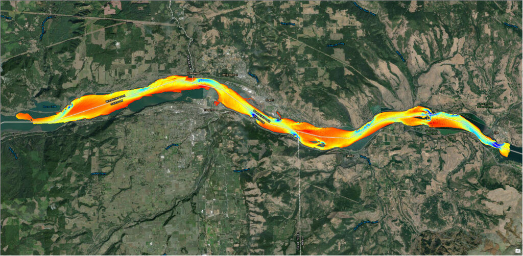 A graphic showing collected bathymetry layered over a satellite image of the Columbia River.