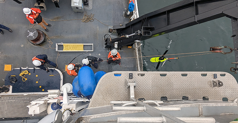 Fairweather's crew recovering the Oculus Glider north of St. Paul. 