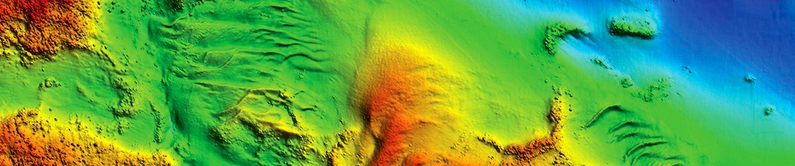 An image of high resolution bathymetry using various colors to represent seafloor elevation.